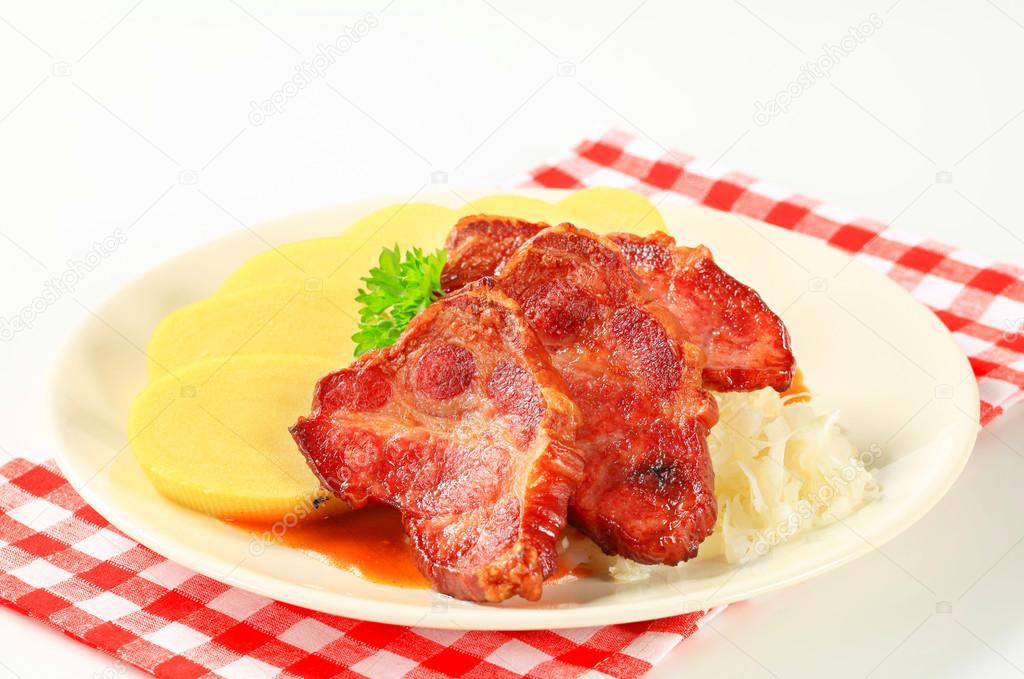 Pork with potato dumplings and sauerkraut