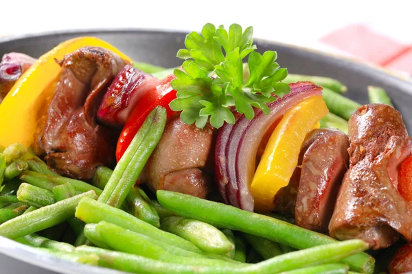 Liver skewer with green beans — Stock Photo, Image