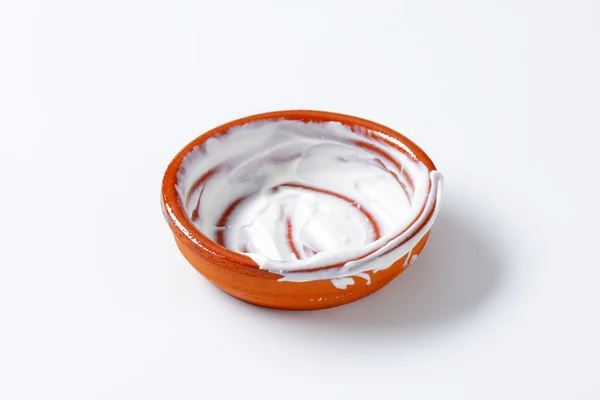 Empty bowl of yogurt — Stock Photo, Image