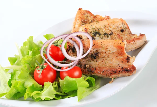 Herb rubbed pork belly slices — Stock Photo, Image