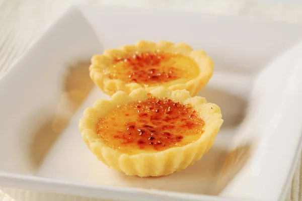 Créme brulée tartlets — Stock Fotó