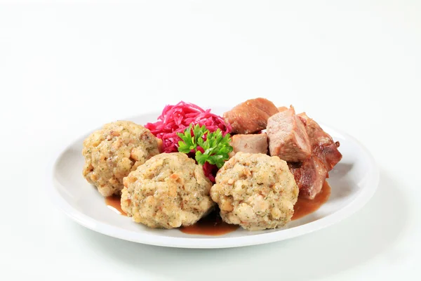 Roast pork with Tyrolean dumplings and red cabbage — Stok fotoğraf