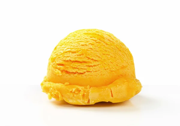 Scoop of yellow ice cream — Stock Photo, Image