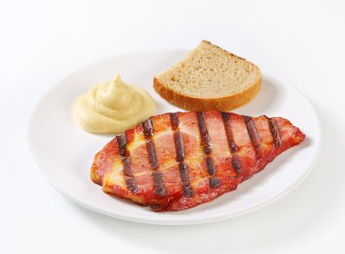 Grilled pork with bread and mustard clipart