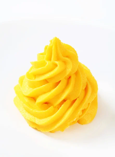 Remolino de crema amarilla — Foto de Stock