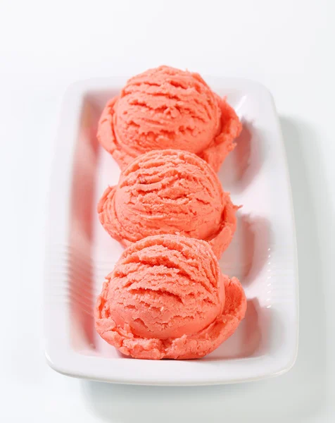 Scoops of pink fruit sherbet — Stock Photo, Image