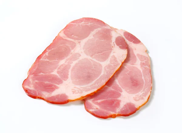 Slices of smoked pork neck — Stock Photo, Image