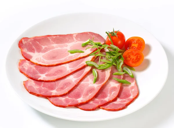 Slices of smoked pork neck — Stock Photo, Image