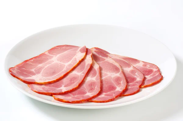 Scheiben vom geräucherten Schweinehals — Stockfoto