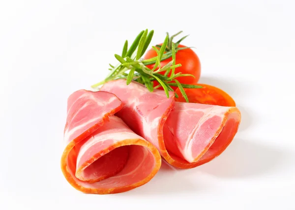 Fette di carne di maiale affumicata - arrotolate — Foto Stock