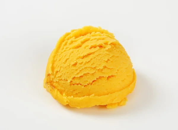 Scoop of yellow ice cream — Stock Photo, Image