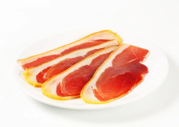 Sliced prosciutto crudo — Stock Photo, Image