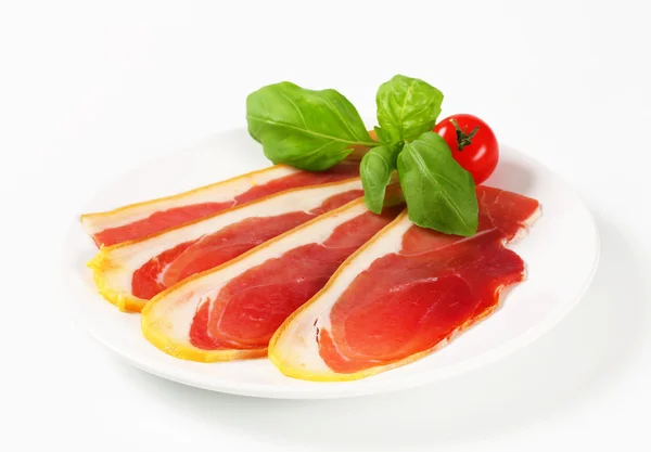 Sliced prosciutto crudo — Stock Photo, Image