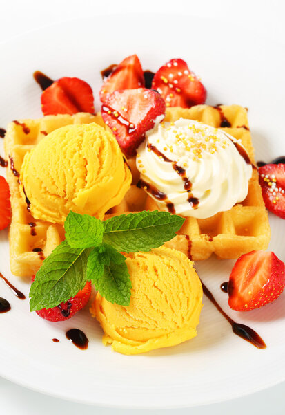 Waffle with ice cream and strawberries