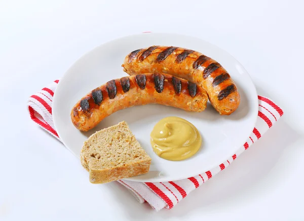 Grilled bratwursts with mustard — Stock Photo, Image