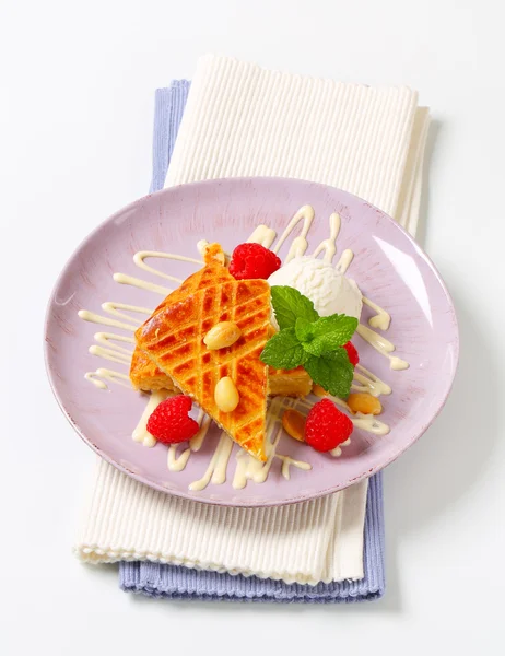 Almond cake with ice cream and raspberries — Stock Photo, Image