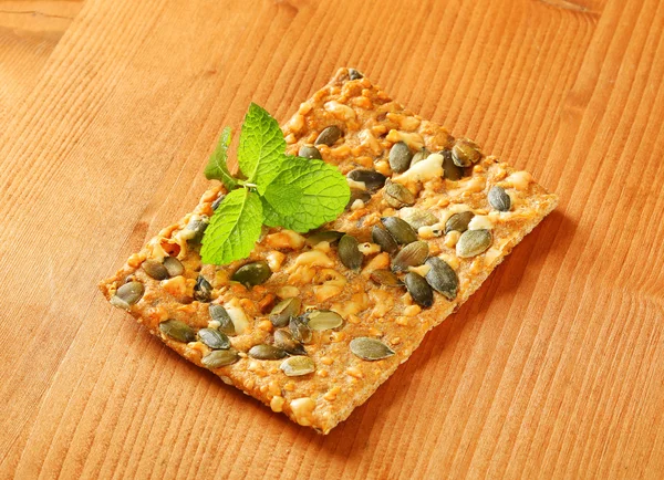 Pumpkin seed cheddar cracker — Stock Photo, Image