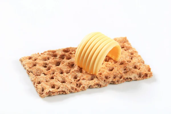 Whole grain crispbread and butter — Stock Photo, Image