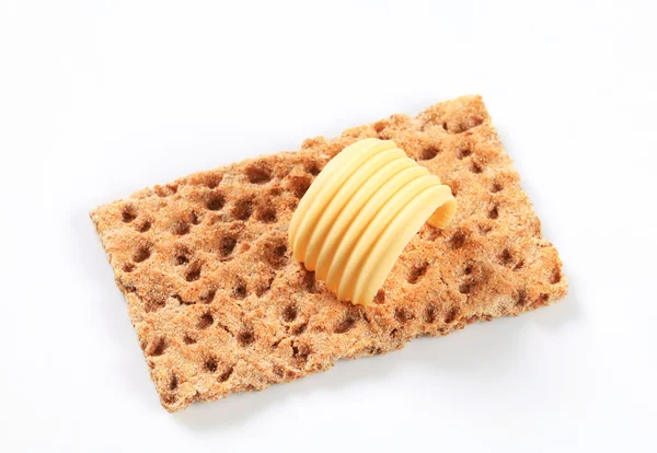 Whole grain crispbread and butter — Stock Photo, Image