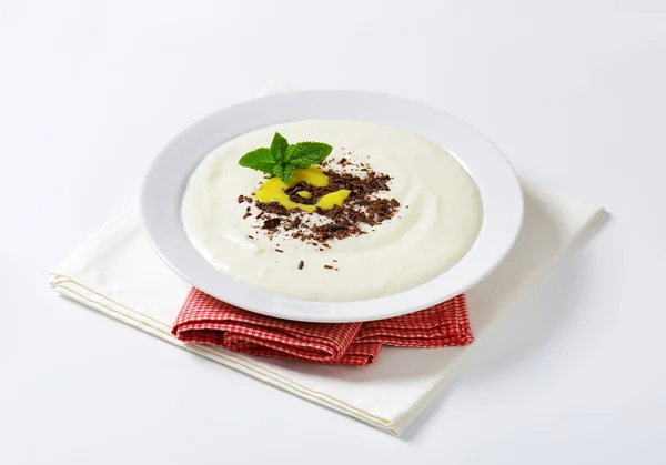 Semolina porridge with grated chocolate and lemon curd — Stock Photo, Image