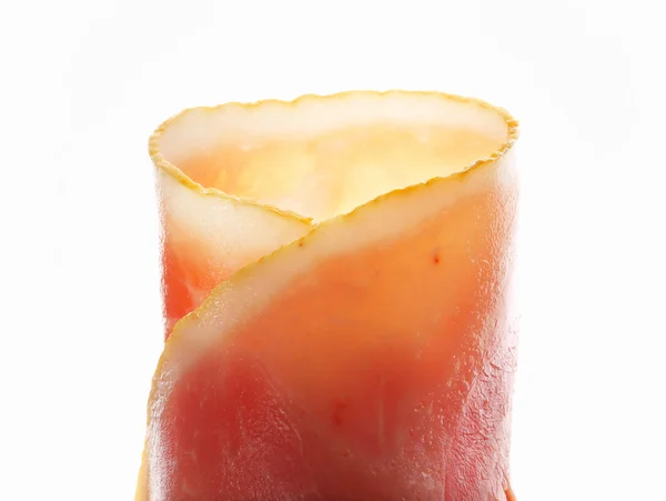 Thin slices of cooked ham, rolled up — Stock Photo, Image