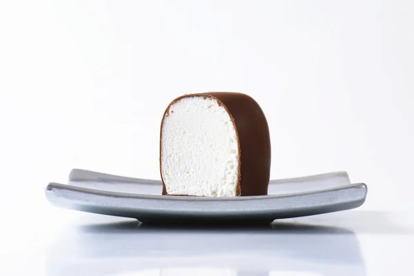 Chocolate-coated marshmallow treat — Stock Photo, Image