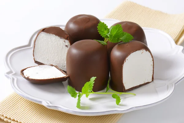 Chocolate-coated marshmallow treats — Stock Photo, Image
