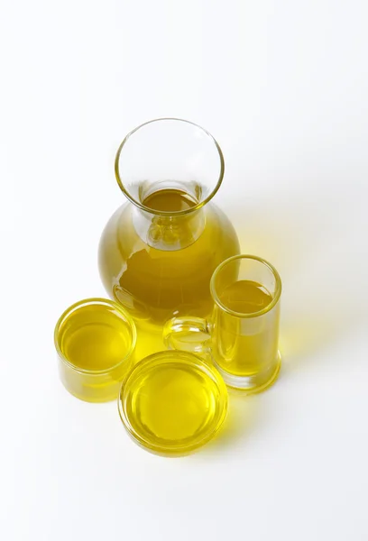 Olive oil in glass vessels — Stock Photo, Image