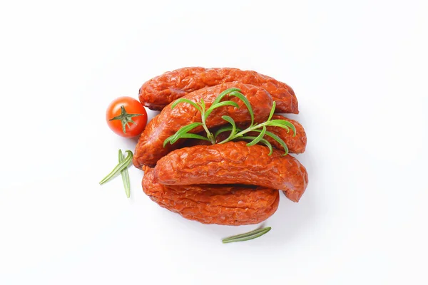 Kielbasa sausages on white background — Stock Photo, Image