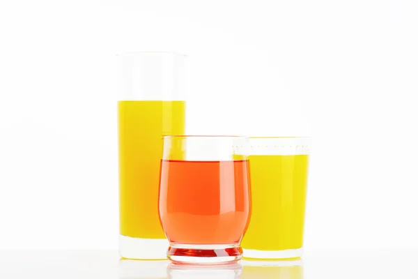 Glasses of fruit juice drinks — Stock Photo, Image