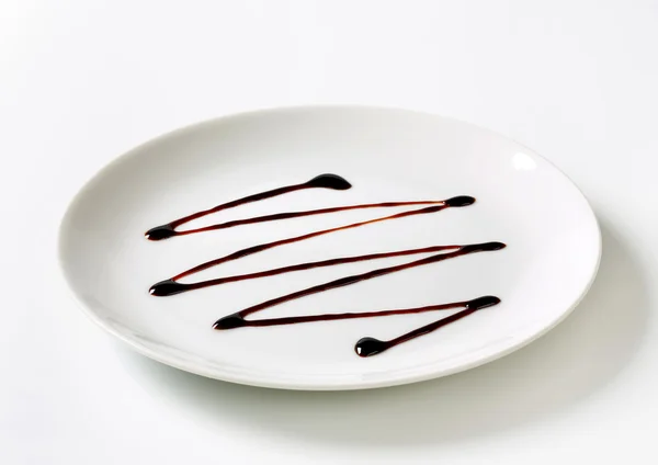 Chocolate syrup drip — Stock Photo, Image