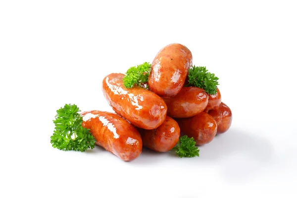 Stack of pan fried sausages — Stock Photo, Image