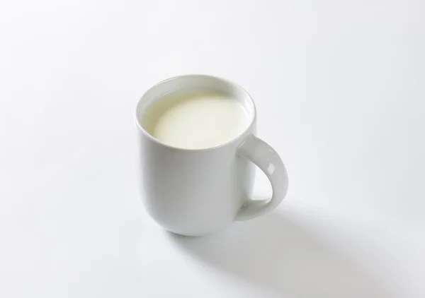 Becher Milch — Stockfoto