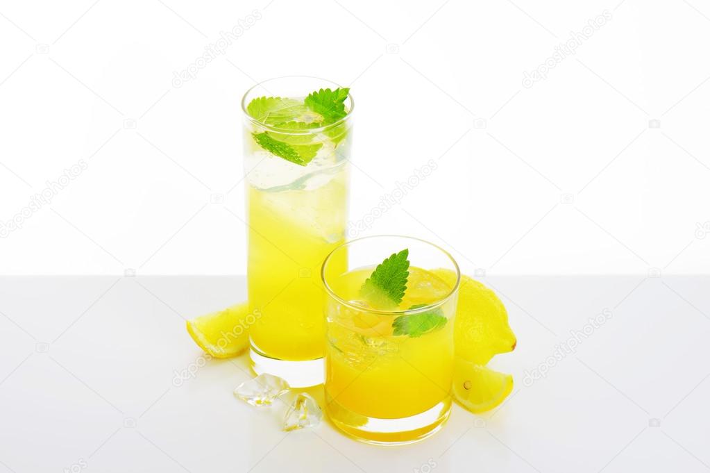 Glasses of lemon juice drink