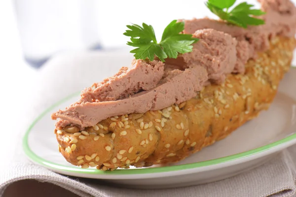 Bread roll with pate — Stock Photo, Image