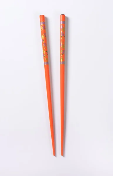 オレンジ色の箸 — ストック写真