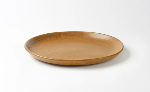 Brown plate — Stock Photo, Image