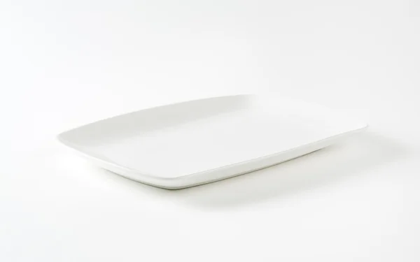 Rectangle white porcelain plate — Zdjęcie stockowe