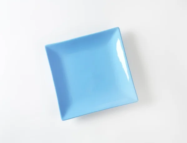 Niebieski kwadrat talerz — Zdjęcie stockowe