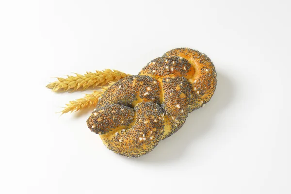 Braided poppy seed bread roll — Stock Photo, Image