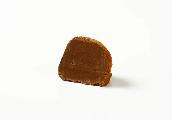 Cocoa dusted chocolate truffle — Stock Photo, Image