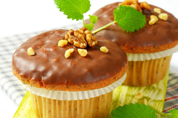 Chocolate glazed muffins — Stock Photo, Image