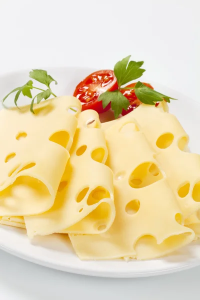 Slices of Swiss cheese — Stock Photo, Image