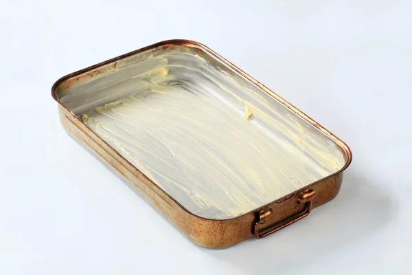Bandeja para hornear con mantequilla — Foto de Stock