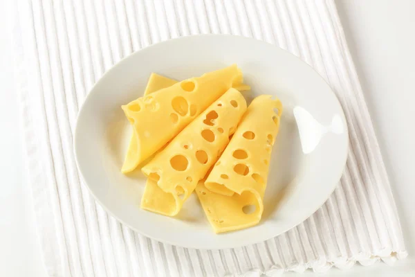 Rebanadas finas de queso suizo — Foto de Stock