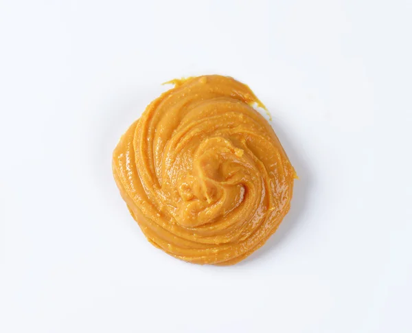 Swirl of peanut butter — Stock Photo, Image