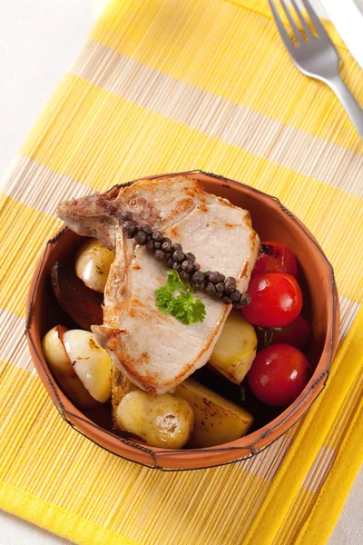 Pork chop and potatoes — Stock Photo, Image