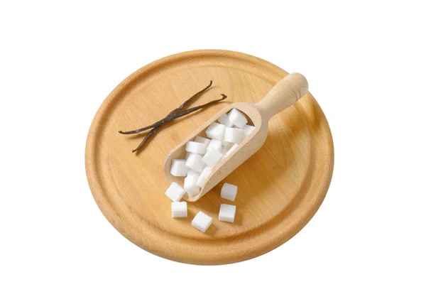 Zucchero bianco cubetti in paletta di legno — Foto Stock