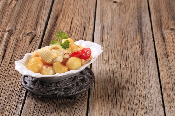 Potatoes with mozzarella cheese — Stock Photo, Image