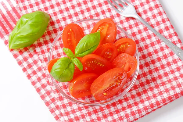 Halved plum tomatoes — Stock Photo, Image